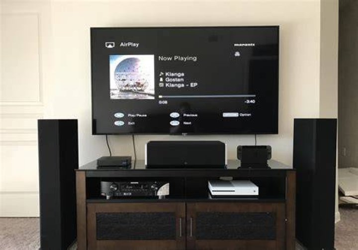 How do I connect my surround sound speakers to my TV?