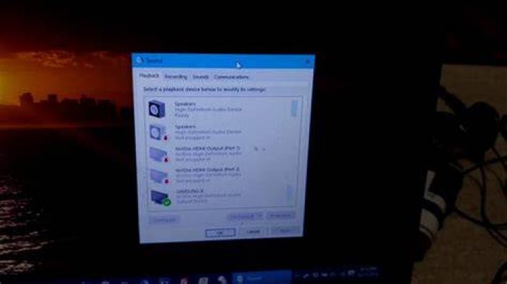 How do I get my laptop to play through my surround sound?