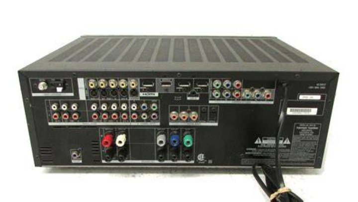 Is the Harman Kardon AVR 154 a universal remote?